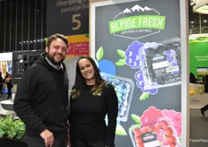 Lucas Rosello and Emily Ottenwalder with Alpine Fresh, offering asparagus and different berry varieties.